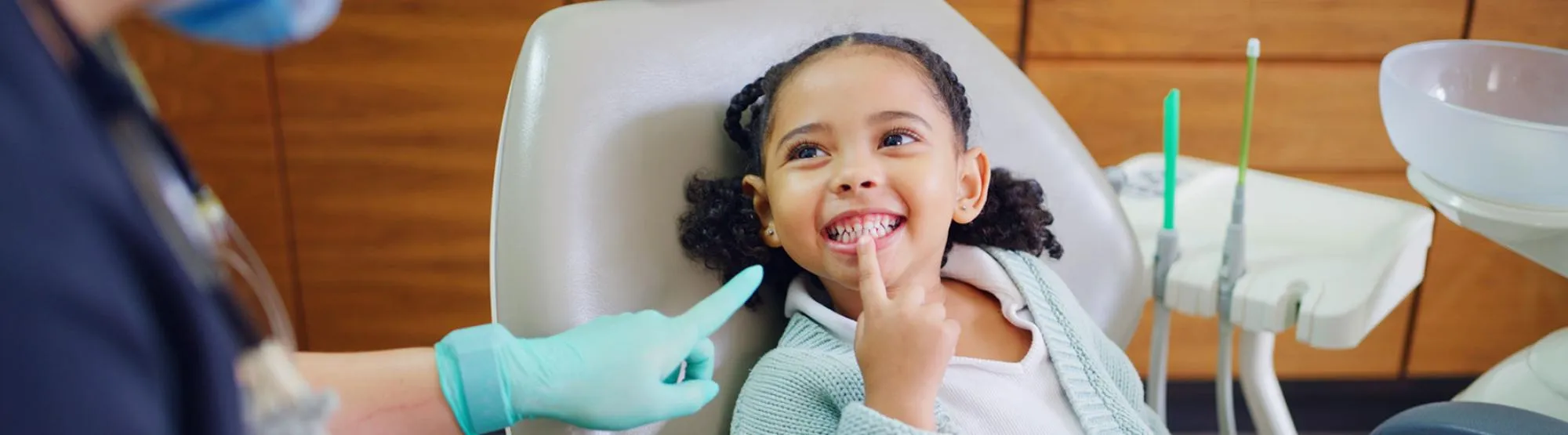 A young child receiving a comfortable first dental check-up at AltaVia Dental