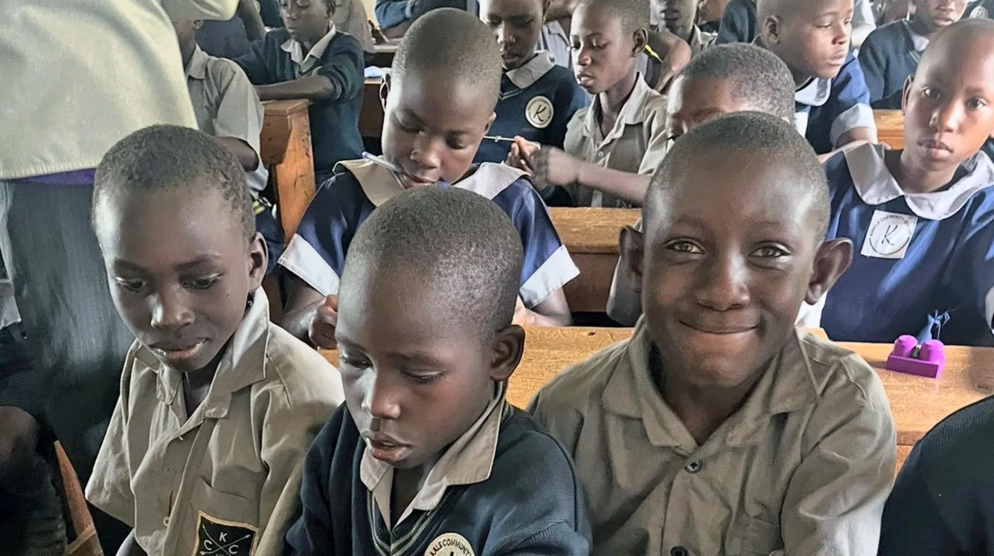 Children in Ugandan school learning about oral health.
